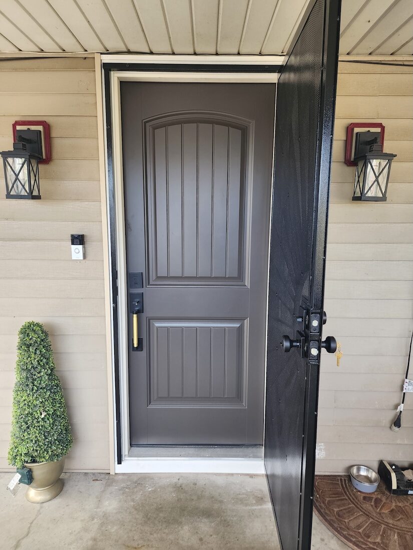Repaired blue lap siding and re-trimmed exterior window on a Hastings, Michigan home — exterior carpentry by 848 Property Services.